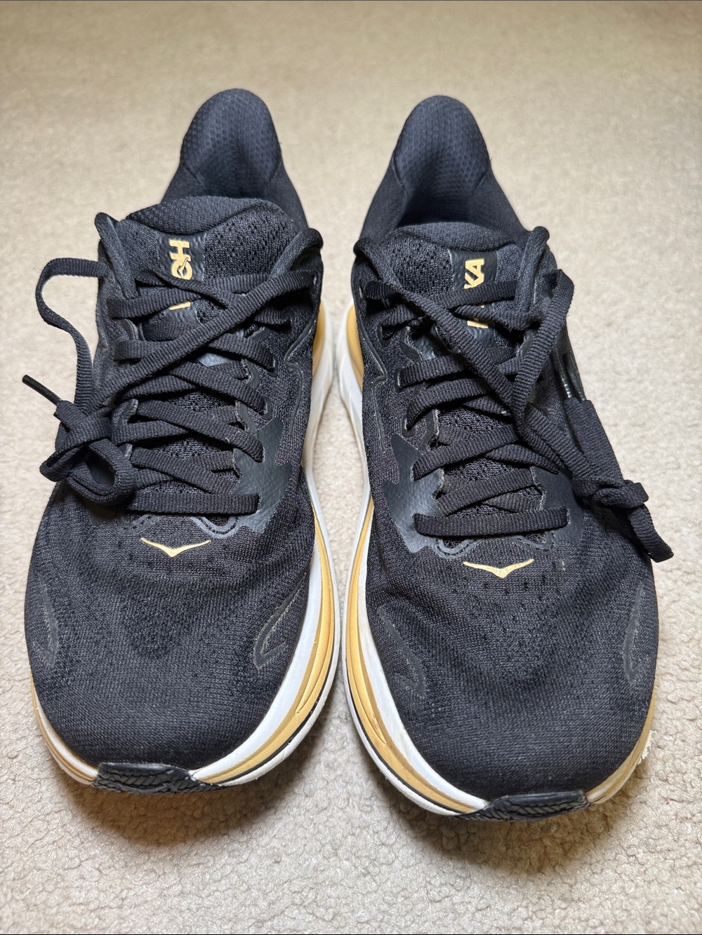 Hoka Black and Gold Women's Athletic Running Shoes - Picture 2 of 13